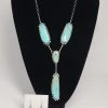 The Sparkling Spur 4 Stone Necklace & Earring Set Jewelry