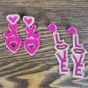 The Sparkling Spur Beaded Love & XO Earrings