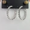 The Sparkling Spur Large Oval CZ Diamond Hoop Earrings