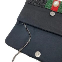 The Sparkling Spur New Arrivals Stripe With Pearls Clutch